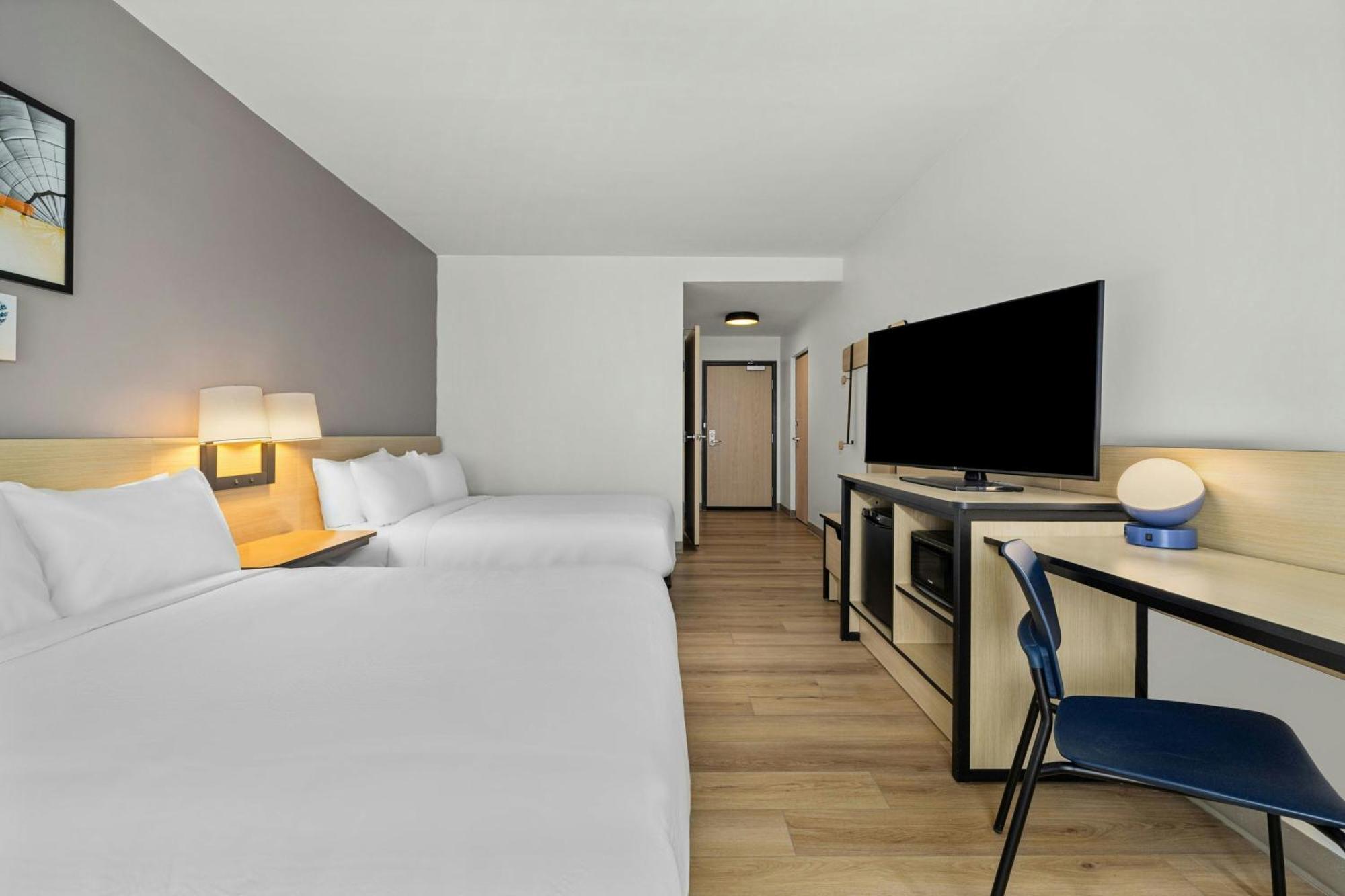 Queen Suite with Two Queen Beds and Sofa Bed